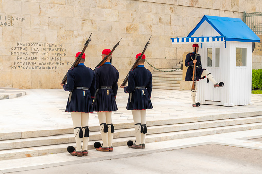 Athens, Greece April 24,2023 Changing of the Guards in Athens, Greece in front of the Parliament building and Memorial to the Unknown Soldier. Blue uniforms.