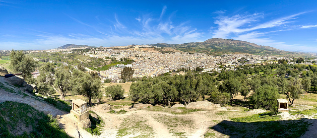 Fes, Morocco, Africa: the stunning panoramic skyline of the city with the old medina and the Ville Nouvelle (New City) surrounded by the hills seen from Borj Sud (Burj al-Janub) fortification