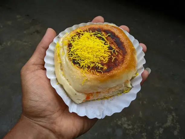 Photo of Holding Indian street food dabeli, kutchi dabeli, India