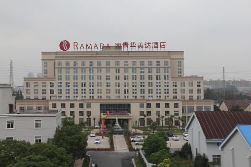 Shanghai, China - October 05, 2016 - Ramada Building with Chinese Features during our driving  in highway