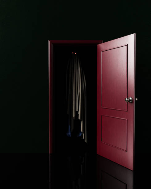 istock dark room with an open door and a ghost peeking out. 1637790144
