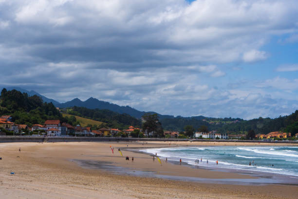 istock Sunny Beach with Waves: Perfect Spot for Surfing and Relaxation 1637848455