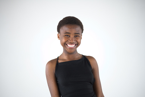 Toothy smile young Black Girl Studio Portrait
