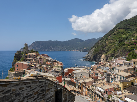 Vernazza, Italy - July 03 2023: The city seen from the hiking trail. Vernazza is a town in the province of La Spezia, Liguria. It is one of the five towns of the Cinque Terre region.