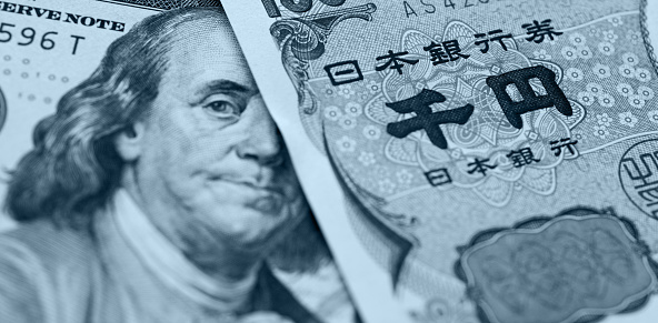 Japanese Yen and US dollar bank note, currency exchange rate