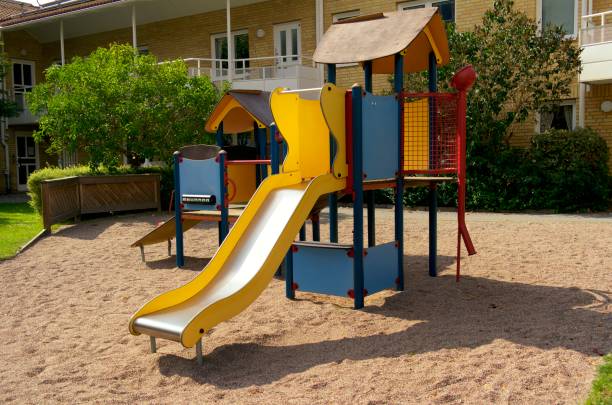 istock Sandbox and slid at playing area 1637896570