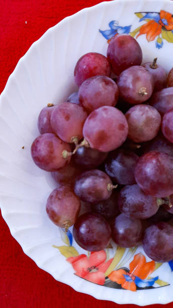 istock Red grapes are a type of fruit that is popular 1637907571