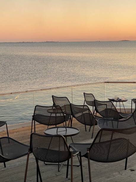 istock Black Metallic Chairs on a Restaurant Terrace in Helsinki, Finland 1637914292