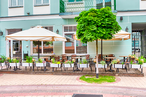 Cosy Terrace of Open Air Cafe on Pedestrian Street on The City of Pinsk. Horizontal image