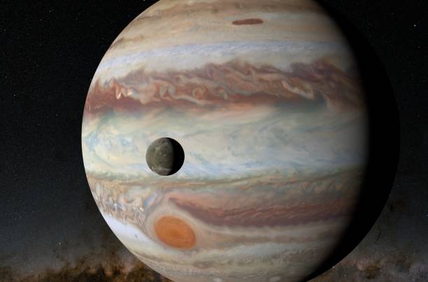 istock Ganymede satellite with Jupiter planet in the solar system - 3d illustration, closeup view 1638002648