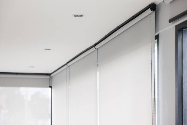 istock white curtain or white blinds Roller sun protection for house. 1638025132