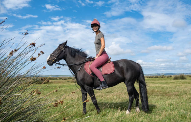 istock Young woman out riding 1638053130