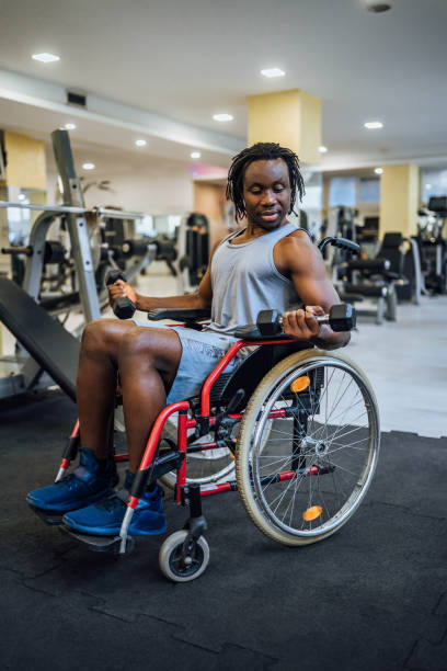 istock Disabled young man in a gym 1638055928