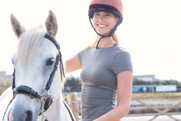 istock Smiling horse rider 1638059740