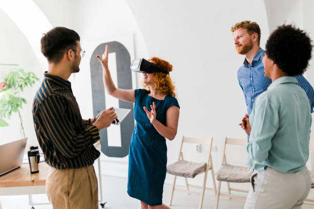 istock Business team presenting new project to a client on a virtual reality simulator. 1638068187