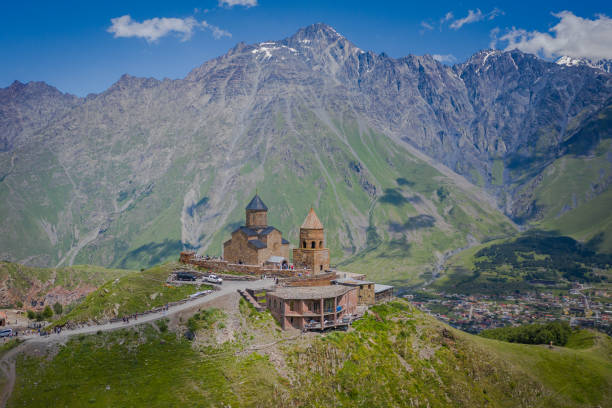 istock Gergeti Trinity Church in Kazbegi, Georgia 1638073150