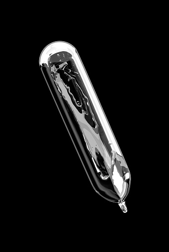 Silver liquid contained inside scientific vial isolated on black background, digital representation of mercury