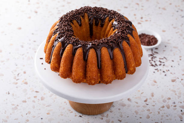 istock Orange pound cake with dark chocolate ganache and sprinkles 1638099183