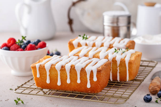 istock Classic pound cake with powdered sugar glaze dripping over 1638099192