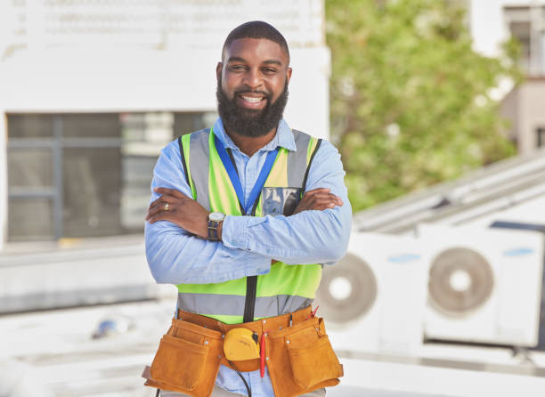 istock Black man, portrait and construction worker, arms crossed and maintenance, engineer smile and architecture outdoor. Male contractor, professional renovation and urban infrastructure with handyman 1638102576