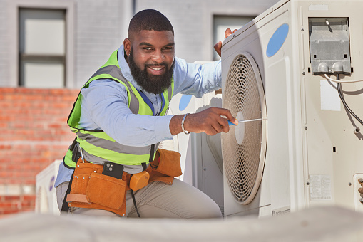 Black man, portrait and maintenance, AC repair and engineering with smile and labor outdoor. African male person, fixing air conditioner and urban infrastructure with tools and electrician on rooftop
