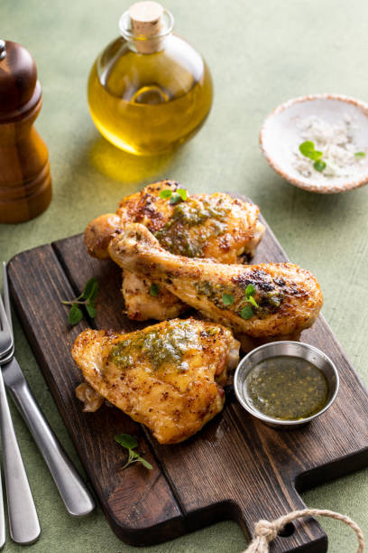 istock Roasted lemon and herb chicken drumsticks and thighs 1638113778