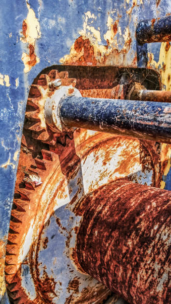 Old Scrapped Rusty Heavy Duty Manual Marine Winch Gear Wheel Transmission Mechanism Detail stock photo
