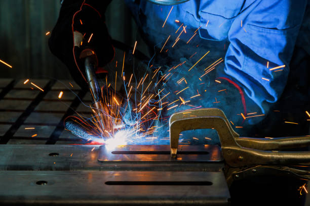 istock Skilled welder carries out various welding works using semi-automatic argon arc welding methods. 1638123757