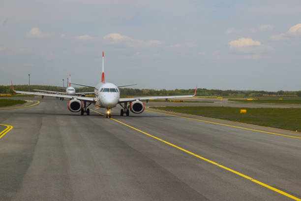 Aircraft on runway is going through it can ready take off.