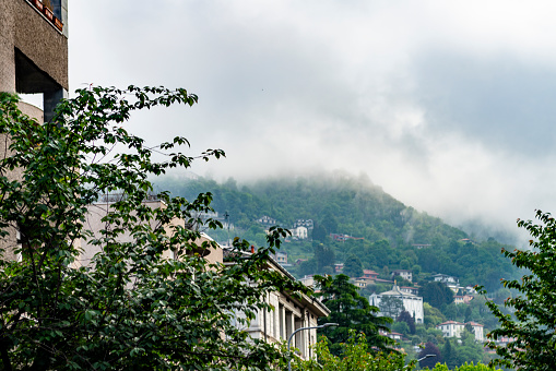 Low cloud over the hills surrounding Como in Italy.