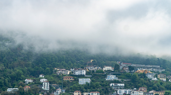 Low cloud over the hills surrounding Como in Italy.