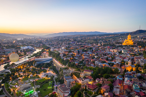 Evening aerial view of old Tbilisi, capital of Georgia from drone.