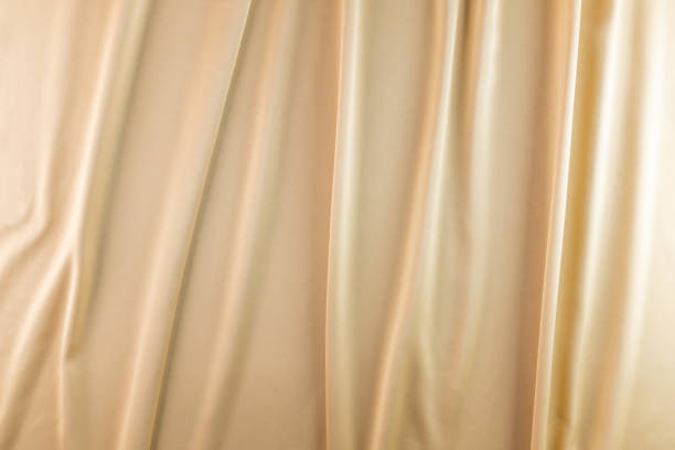 istock Liquid wave luxury gold fabric abstract silk background 1638221895