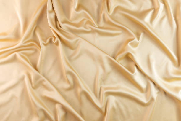 istock Liquid wave luxury gold fabric abstract silk background 1638221903