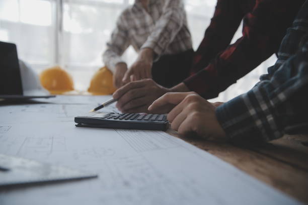 istock Engineer Teamwork Meeting, Drawing working on blueprint meeting for project working with partner on model building and engineering tools in working site, Construction and structure concept. 1638239546