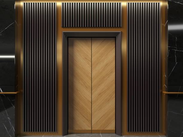 moderne aufzugstüren in der art-deco-lobby - door symmetry wood hotel stock-fotos und bilder