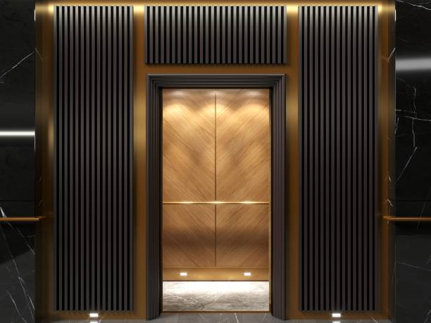 modern elevator doors in art deco lobby - door symmetry wood hotel imagens e fotografias de stock