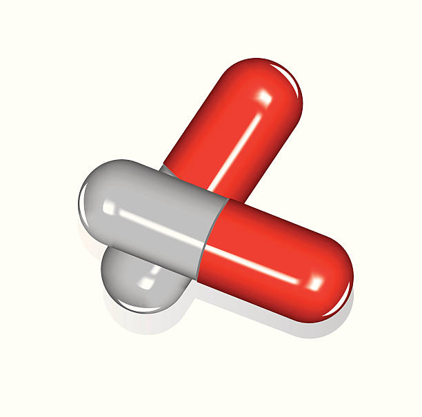 Red capsules vector art illustration