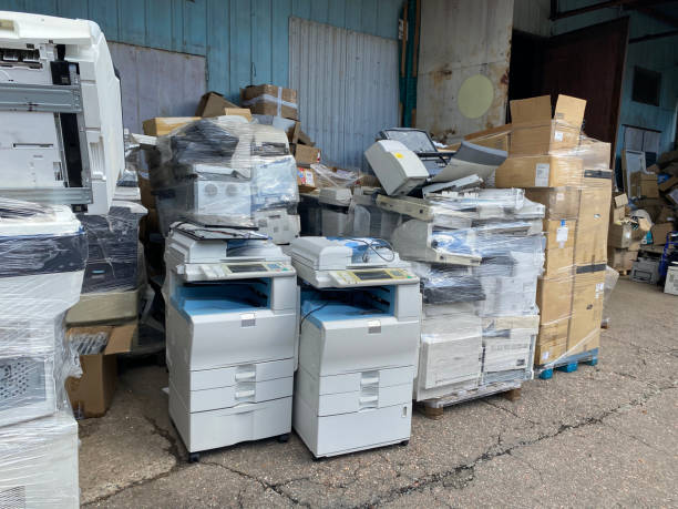 istock Sorting electronic waste for recycling. Cell phone photo of a warehouse. 1638290294