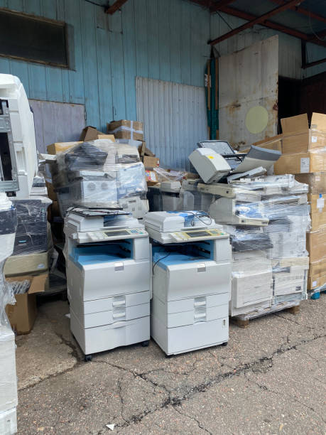 istock Sorting electronic waste for recycling. Cell phone photo of a warehouse. 1638290806
