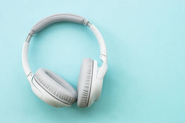 istock Wireless Headphones on blue background. 1638300480
