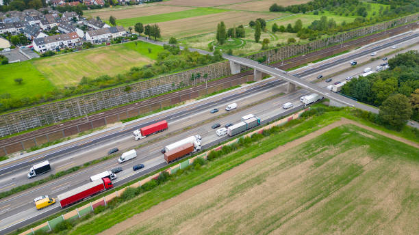 multiple lane highway, traffic jam - aerial view - multiple lane highway highway car field imagens e fotografias de stock