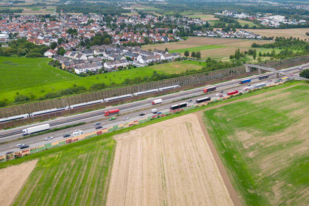 multiple lane highway, traffic jam - aerial view - multiple lane highway highway car field imagens e fotografias de stock