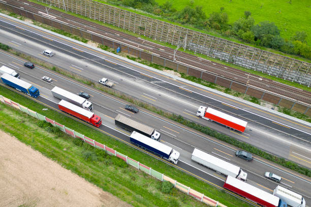 multiple lane highway, traffic jam - aerial view - multiple lane highway highway car field imagens e fotografias de stock