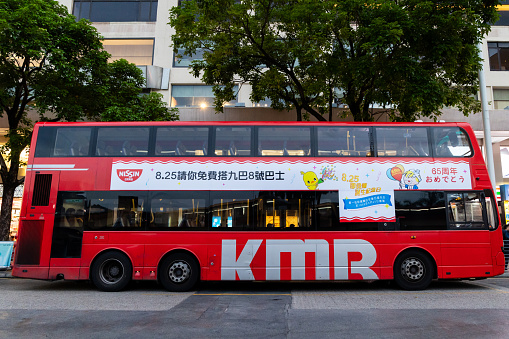 Hong Kong - August 25, 2023 : Kowloon Motor Bus Route 8 during a free ride day on 25 August in Hong Kong. Passengers can enjoy unlimited free rides with Route 8 to celebrate the 65th Anniversary of instant noodles.