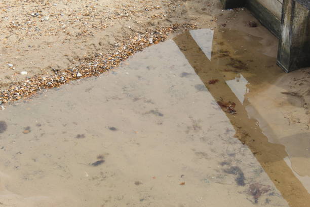 istock A water puddle on a sandy beach in England, Bourn 1638409804