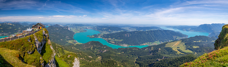 panoramic view from the top of Mount Schafberg over the landscape with mountains and Lake Mondsee and Lake Attersee, Alps, Austria