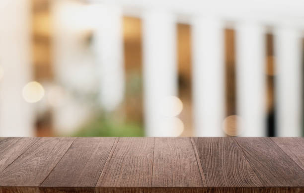istock Wood Table Top in Blur Background room interior with empty copy space. 1638450832