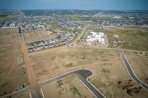Aerial view of the Austin area featuring Amazon shipping Warehouse VTX9 and the Applied Materials Complex alongside Route 290 outside of Austin Texas