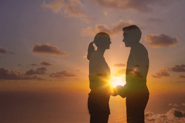 istock Couple holding hands and looking at each other. 1638506946
